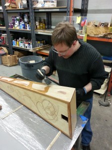 Applying finish to the harp
