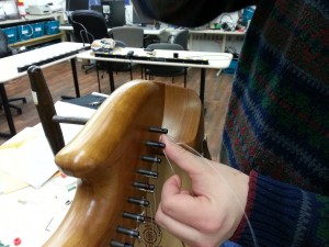 Installing the last harp string
