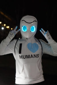 Skylar at Katsucon dressed as Drossel with a hoodie that says "I HEART HUMANS"